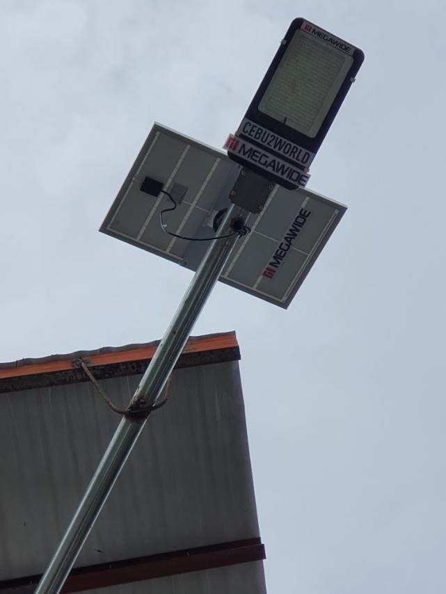 C:\Users\GCPI-ROBBY\Desktop\PRS\C2W is providing solar lights around the carbon area while electricity is not yet reconnected 2.jpg