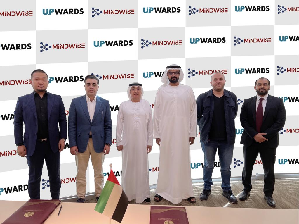 C:\Users\GCPI-ROBBY\Desktop\PRS\Owner of Upwards, Dr. Ali Naser Yabhouni Dhaheri, and the owner of MINDWISE, Mr. Mikayel Pashayan, in the presence of Upwards CEO Mr. Abdullah Lei Shen, Tahaluf Al Emarat CEO Mr. Yahia Alhami, D.png