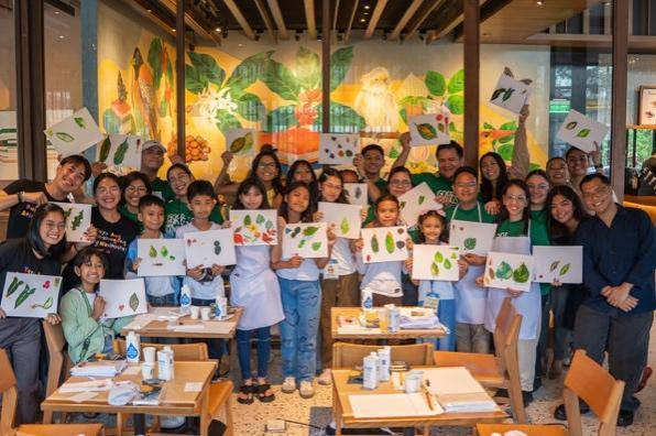 A group of people holding up posters AI-generated content may be incorrect.