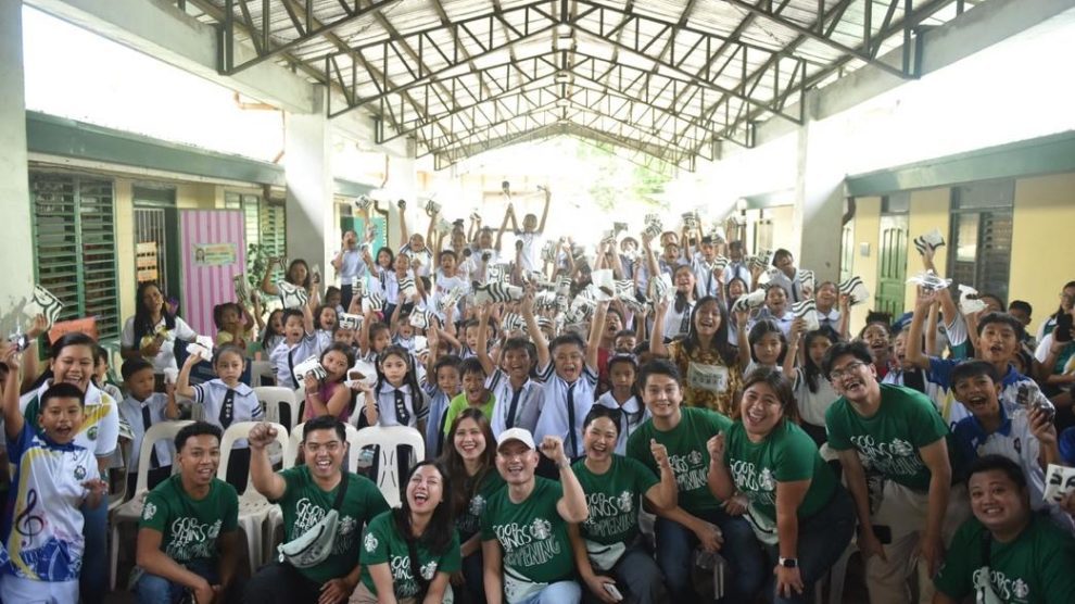 A group of people posing for a photo AI-generated content may be incorrect.