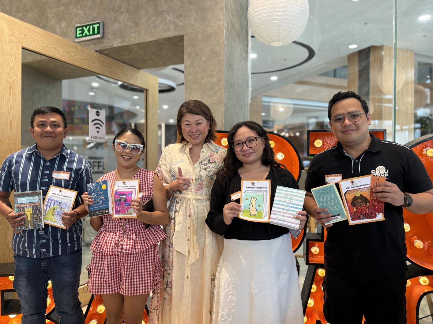 Jacqueline Ng, Co-founder of Big Bad Wolf Books, with Painting Workshop Winners(1)