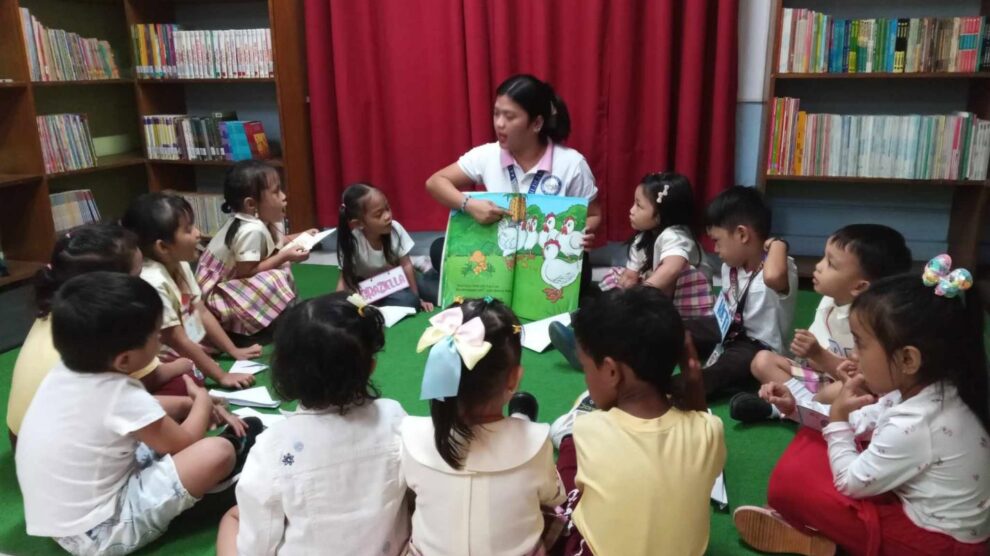 Childlink teacher teachng the students