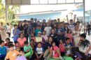 5 - Teacher Janice taking the photo opportunity after her yoga session with the students and their parents